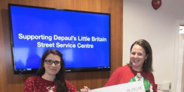 Crowe Ireland staff present fundraising cheque to Depaul